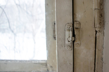 Old window frame with a latch.