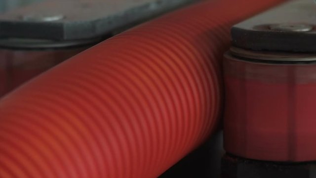 Corrugated plastic pipe production line close-up