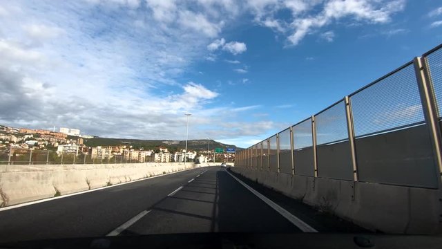 Dashboard point of view driving on ring road in Trieste