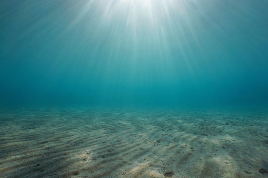 Sand underwater on the seabed with sunlight, natural scene, Mediterranean sea © dam