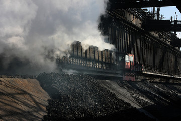 Coke making plant on large integrated steelworks with emission issues.