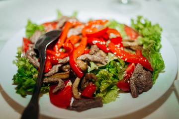 Red pepper salad, cabbage and veal leaves
