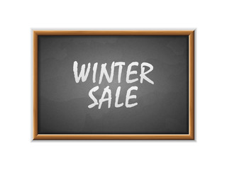 Fototapeta premium Winter sale written on a blackboard