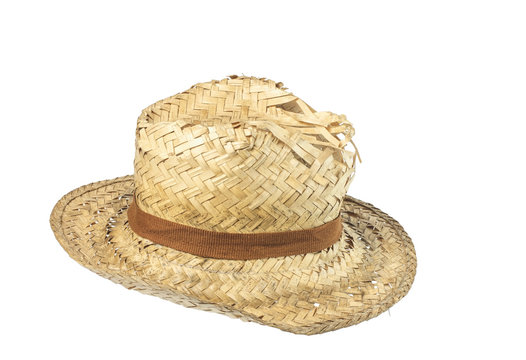 Old worn-out farmer straw hat isolated on white background with clipping path.