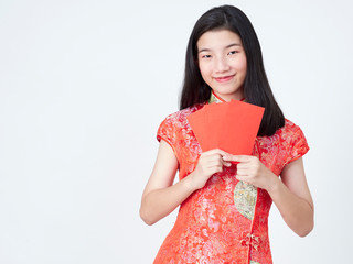 Woman in traditional chinese dress holding red envelope