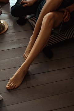 women's slender legs on the floor