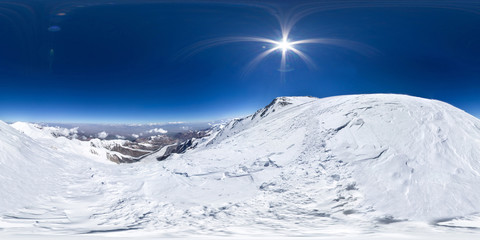 Spherical panorama of the Pamir mountain. Slope of Lenin Peak to an altitude of 6800 meters. Spherical panorama 360 degrees 180 Mountain hiker to climb a mountain of snow couloir.