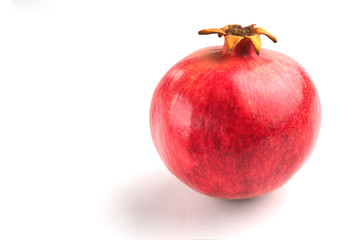 Red pomegranate on a white background
