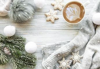 Fototapeta na wymiar Cup of coffee and Christmas decorations