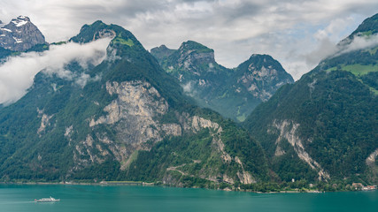 Switzerland, Panoramic view on green Swiss Alps and lake Lucerne near Isleten