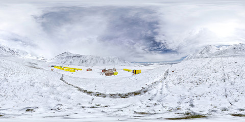 Spherical panorama of the Pamir mountain. Slope of Lenin Peak to an altitude of 3800 meters. Spherical panorama 360 degrees 180 Mountain hiker to climb a mountain of snow couloir.