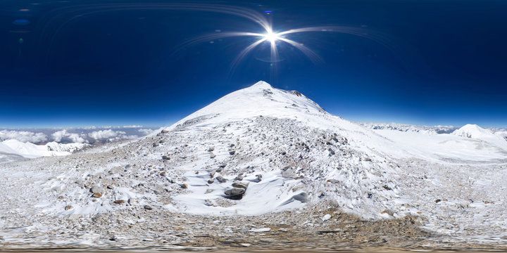 Spherical panorama of the Pamir mountain. Slope of Lenin Peak to an altitude of 6900 meters. Spherical panorama 360 degrees 180 Mountain hiker to climb a mountain of snow couloir.