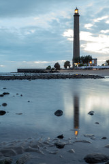 lighthouse on coast of sea