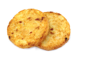 several rösti cooked on a white background