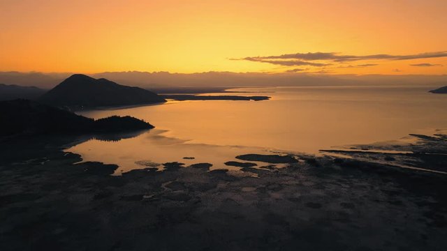 Sunrise at Lake Skadar, Montenegro. Dolly shot. Aerial, drone footage.