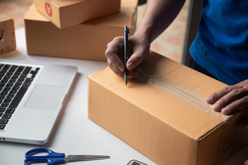 Customer Man signature in clipboard to receive package from professional delivery man at home, sign and receive deliver e-commerce concept banner.