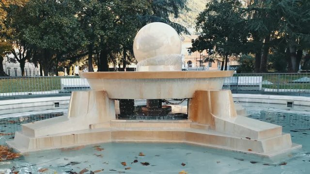 Carrara, Tuscany: the marble fountain with a big floating marble sphere