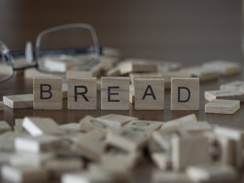 Bread the word or concept represented by wooden letter tiles