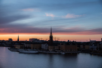 Obraz premium Stockholm at dusk with fireworks.
