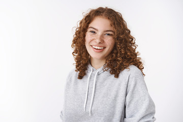 Waist-up attractive caucasian lucky cheerful redhead girl with curly hair freckles pimples forehead...