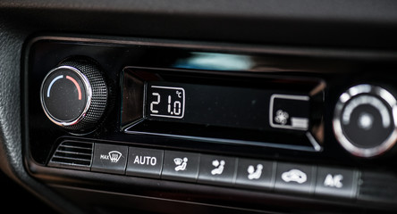 Car radio dashboard buttons like volume, climatronic, setup, sound.