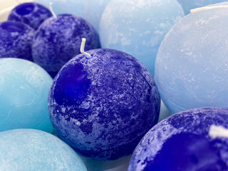 blue candles for sale in a supermarket