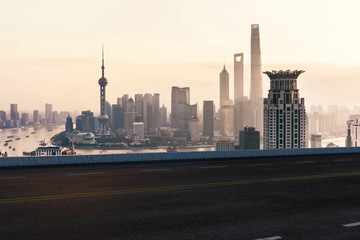 Asphalt road and urban building of Shanghai, driveway and road.