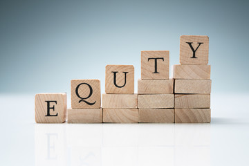 Stack Of Blocks Arranged In A Row Showing Equity Text
