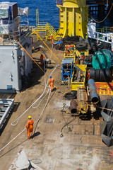 Condition of main deck of a construction work barge preparing to perform a heavy lifting