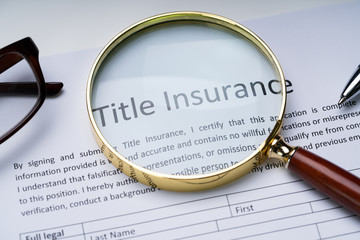 Title Insurance Form On Table