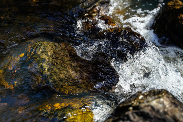 water flowing over rocks