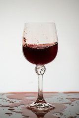 drops of wine in a glass on a light background7