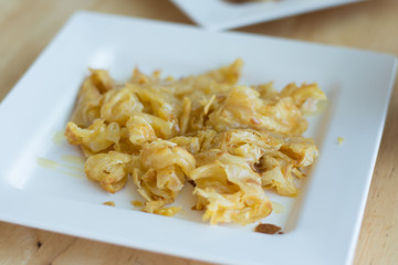 Roti with cheese on white plate,Roti on the table