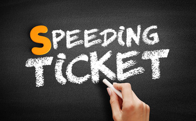 Speeding ticket text on blackboard
