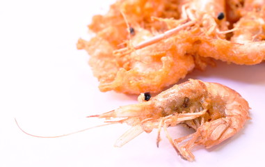 deep fried shrimp with flour on white background