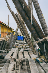 Beautiful rural scenery, wooden jetty or traditional fisherman dock over cloudy sky background