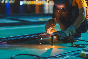 A man working as a welder	