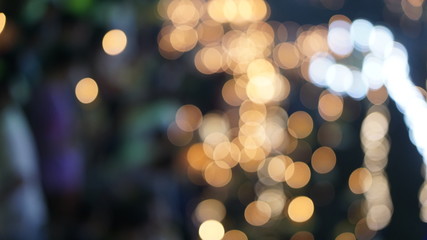 Obraz premium Light gold point on night time is suitable for use as a background concept. Abstract texture. Colorful. Defocused Blurred bright light. Circular round points concept. 