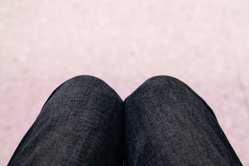 Sit with your knees close together