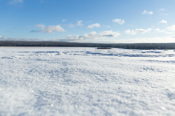 Obraz premium winter landscape with blue sky and white clouds
