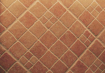 diamond-shaped terracotta tile floor