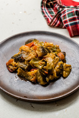 Turkish Food Saksuka with Eggplant with Tomatoes and Olive Oil. / Patlican Cigirtma.
