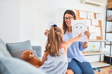 Young therapist woman speaking and treating child, counselor and behaviour correction at pedagogue...