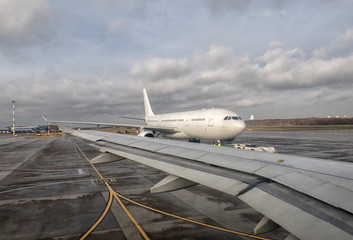 Airplane at the terminal gate ready for takeoff