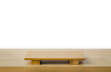 Empty sushi board on wood table with white background. Top view of plank wood for graphic stand product, interior design or montage display your product