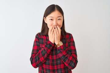 Young chinese woman wearing casual jacket standing over isolated white background laughing and embarrassed giggle covering mouth with hands, gossip and scandal concept