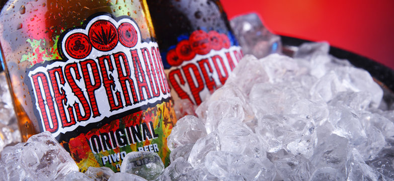 Bottles of Desperados beer in bucket with crushed ice