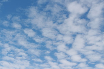 Blue sky white clouds background
