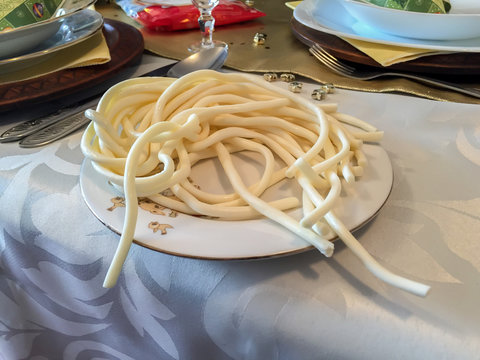 Traditional slovak string cheese - caling korbacik on holiday table