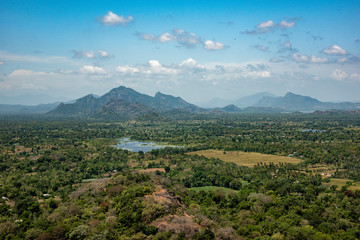vista of  mountains, lakes and jungle  from the top if the Lion Rock
